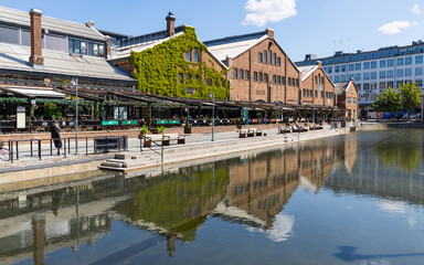 Old port Elvehavn in Trondheim, Norway now used as tourist area with restaurants and shops