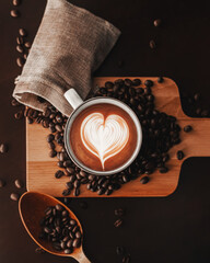 Latte coffee top down wooden background decoration around coffee beans