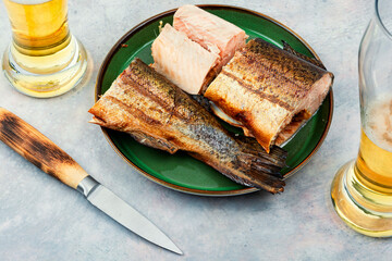 Smoked trout salmon and beer.
