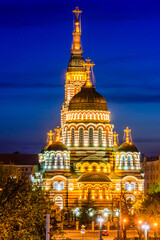 Obraz premium View of the illuminated Annunciation cathedral in Kharkiv, Ukraine