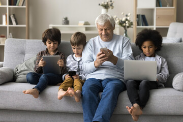 Addicted in modern tech and internet usage multigenerational people spend time at home,...