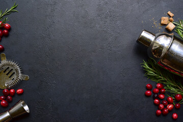 Ingredients and props for making festive christmas cocktail with cranberries and rosemary. Top view with copy space. - obrazy, fototapety, plakaty