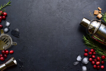 Ingredients and props for making festive christmas cocktail with cranberries and rosemary. Top view with copy space. - obrazy, fototapety, plakaty