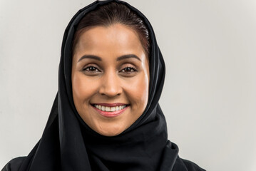 Arabian beautiful woman wearing traditional middle-eastern abaya portrait on isolated background - obrazy, fototapety, plakaty