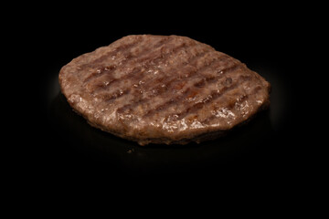 Cutlet with minced beef isolated on  black background.