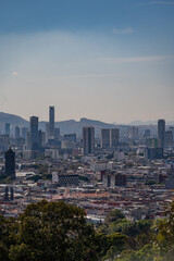 Fototapeta premium Beautiful view of the large Mexican city of Puebla. View of the endless mountain peaks around the city.
