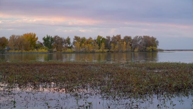 fall dusk scenery in Boyd Lake State Park in Loveland, Colorado, with a light breeze