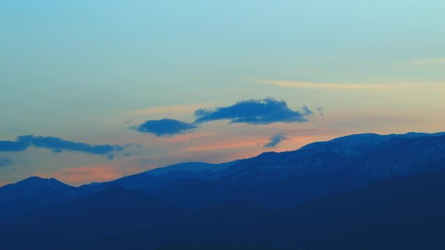 Colorful Sunrise Over Mountains And Peaks With Clouds. Natural Background. Timelapse.