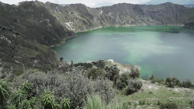 aerial of laguna quilotoa at the quilotoa loop in the andes.