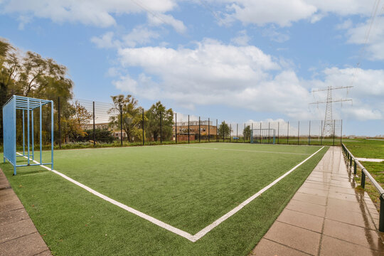 Soccer field with grassy lawn and white lines