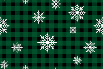 Snowflakes on a cute green checkered background. Seamless winter holiday pattern. Graphic scottish texture. Fashionable print for gift wrapping, fabric, cover, social media stories