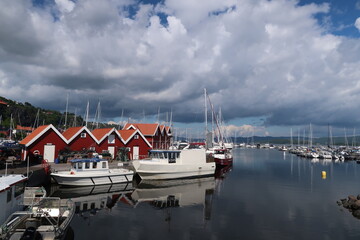 Boats in a small cozy village on the norwegian coast