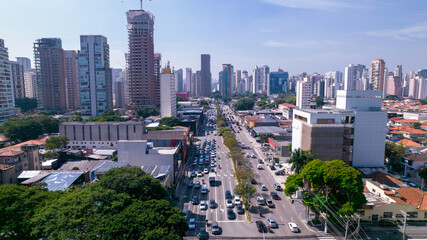 Obraz premium Aerial view of Avenida Brigadeiro Faria Lima, Itaim Bibi. Iconic commercial buildings in the background. With mirrored glass