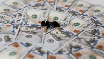 Set of keys on the money in the background. The key for a new property. Real estate formalities. Concept of house purchase.