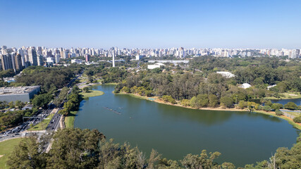 Fototapeta premium Aerial view of Ibirapuera Park in São Paulo, SP. Residential buildings around. Lake in Ibirapuera Park