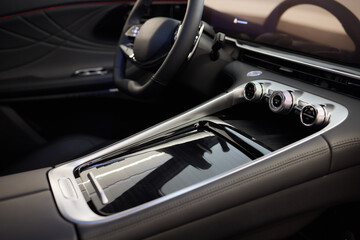 Selector automatic transmission with leather in the interior of a modern expensive car. The...