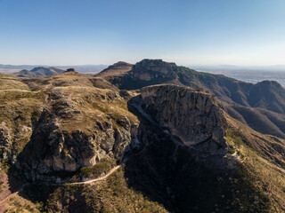 A beautiful aerial view of the endless mountains around the Mexican city of Guanajuato at sunset.
