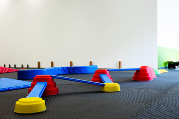Vibrant Indoor Play Area: A Hub for Kids' Physical Development and Fun. - obrazy, fototapety, plakaty