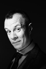 Attractive man in suit 50s studio shot