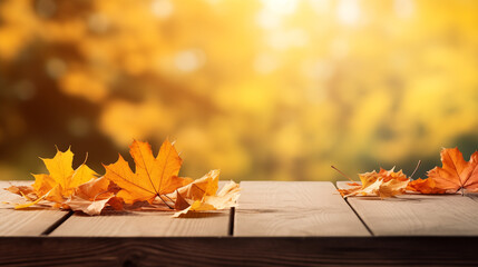 Naklejka na ściany i meble Maple leaves of autumn adorn a wooden tabletop, creating a natural background of falling leaves. A sunny autumn day unfolds in the park, showcasing the beauty of orange foliage. The scene forms a wide