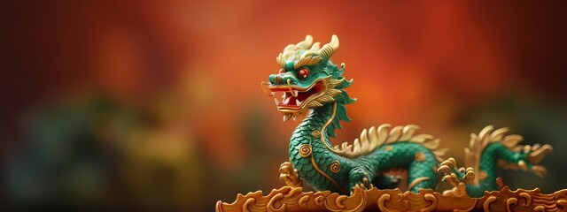 Obraz premium Green Chinese Dragon on blurred background. The year of the Dragon in China and Eastern Asia. One of the Chinese zodiac signs. New Year of the Dragon 2024