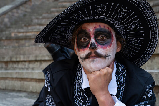 Young man dressed as catrin for day of the dead cellebration