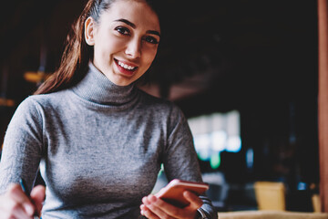  technology concept with connected happy millennial hipster girl indoors