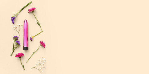 Beautiful flowers and vibrator on beige background with space for text