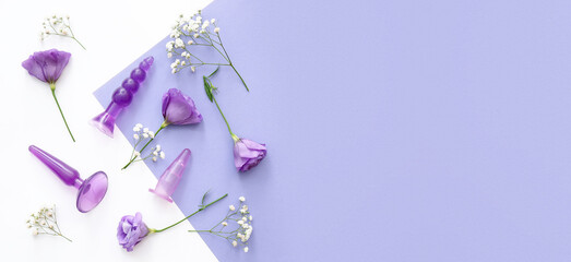 Flowers and sex toys on color background with space for text
