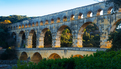 Pont du Gard, ancient Roman aqueduct across Gardon River in southern France - obrazy, fototapety, plakaty