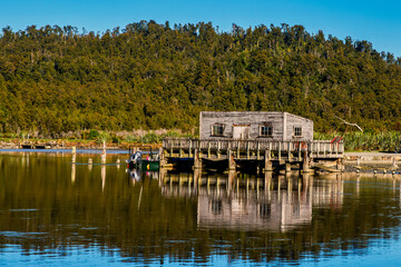 Obraz premium Okarito Lagoon is New Zealand's largest unmodified wetland. A coastal lagoon lined by the snow capped southern alps and the home to native birds