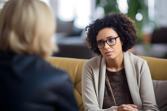 Therapist listening intently providing comfort and guidance to those in need.
