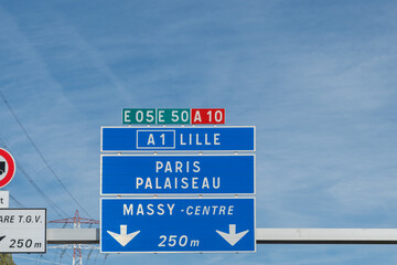 Highway road signs Paris, driving in heavy traffic on ring road of capital of France, traffic jam problems in Paris