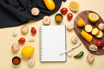 Composition with blank recipe book, spices and vegetables on color background