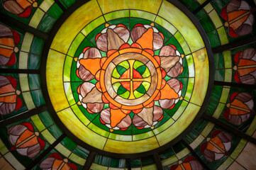 Art deco colorful floral styled decoration on walls, cellar and lights in traditional French cafe bouillon