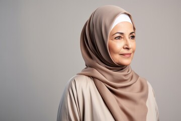 senior woman thinking with pensive expression against wall background. ai generated