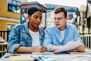Diverse students collaborating on common project