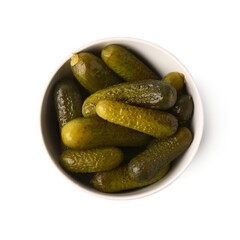 Bowl with delicious fermented cucumbers on white background