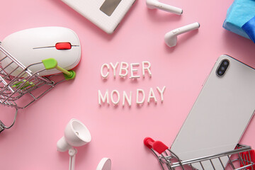 Fototapeta na wymiar Composition with text CYBER MONDAY and different gadgets on pink background