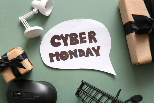 Speech bubble with text CYBER MONDAY, gift boxes and gadgets on color background