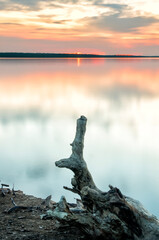 Salt ponds close to the port of Pasuruan, Indonesia at sunset, photographed using the long exposure technique