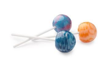 Three tasty colorful lollipops isolated on white