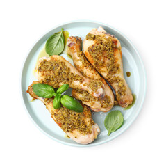 Delicious fried chicken drumsticks with pesto sauce and basil isolated on white, top view