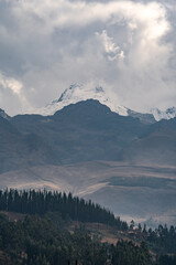 Sunset view of mountain peaks covered with snow at sunset in the Peruvian city of Huaraz.