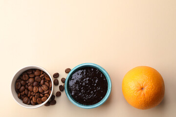 Flat lay composition with natural body scrub and fresh ingredients on beige background, space for text. Anti cellulite treatment