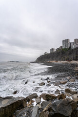 Beautiful Pacific Ocean waves crashing on the coast in Miraflores district. 