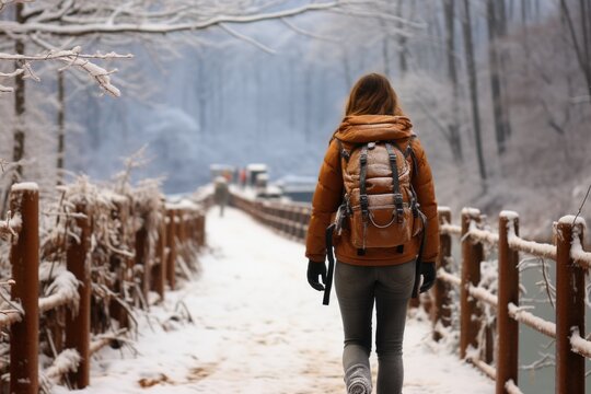 woman walking in winter forest