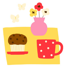 チョコレートマフィンとコーヒーと花瓶の花