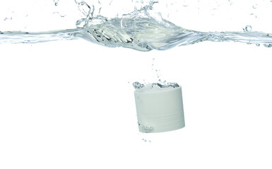 Cosmetic container fall into clear water with air bubble. Small cosmetic treatment container drop to clear water of freshness. White background isolated freeze element