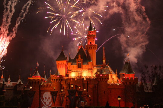 Disneyland 60th anniversary castle with fireworks. Anaheim, CA USA - September 3, 2015: Disneyland 60th celebration castle with over 150 thousand people.